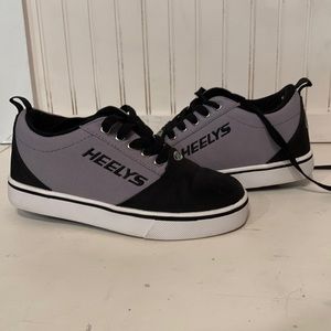 Black and gray heelys.